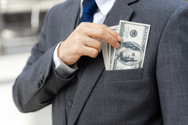 close-up-business-man-holding-money-us-dollar-bills-hand